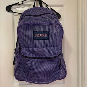 Purple mesh Jansport backpack.